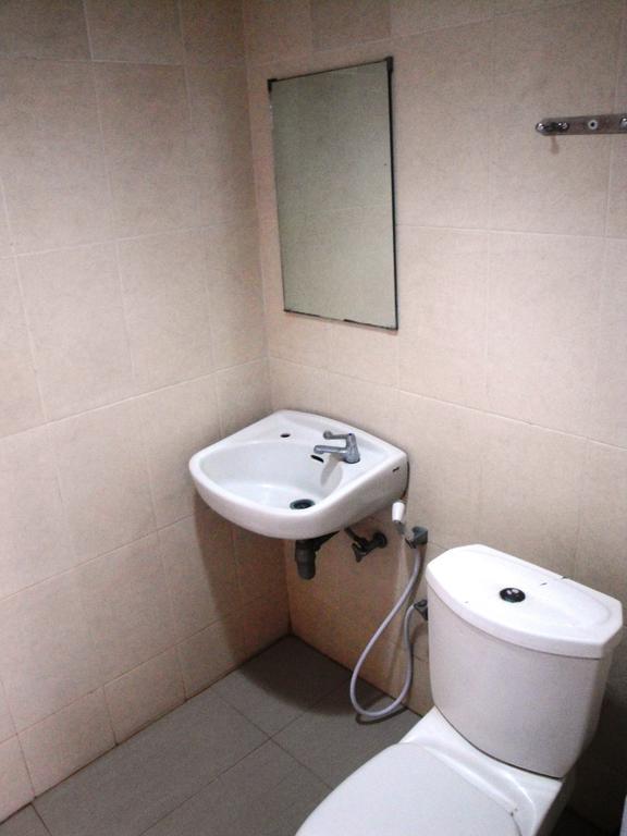 Hotel Metropolitan Inn Manado Room photo